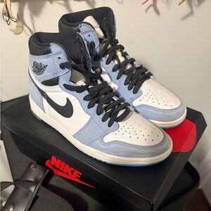 Nike Air Jordan High-Tops in Black, White, and Light Blue